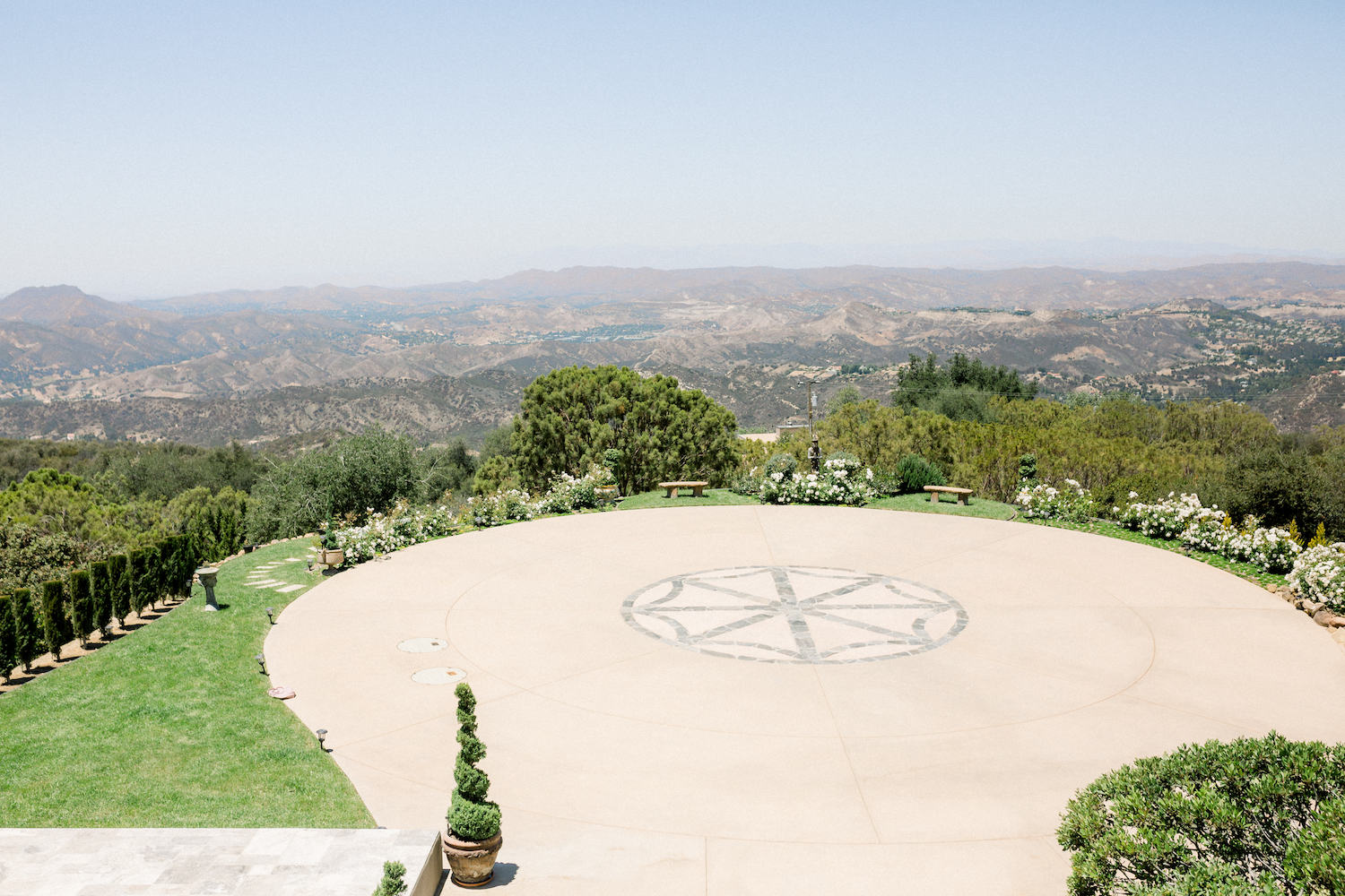Stone Mountain Estates Luxury Wedding Venue Guide: Helicopter pad over-looking the mountain ridge