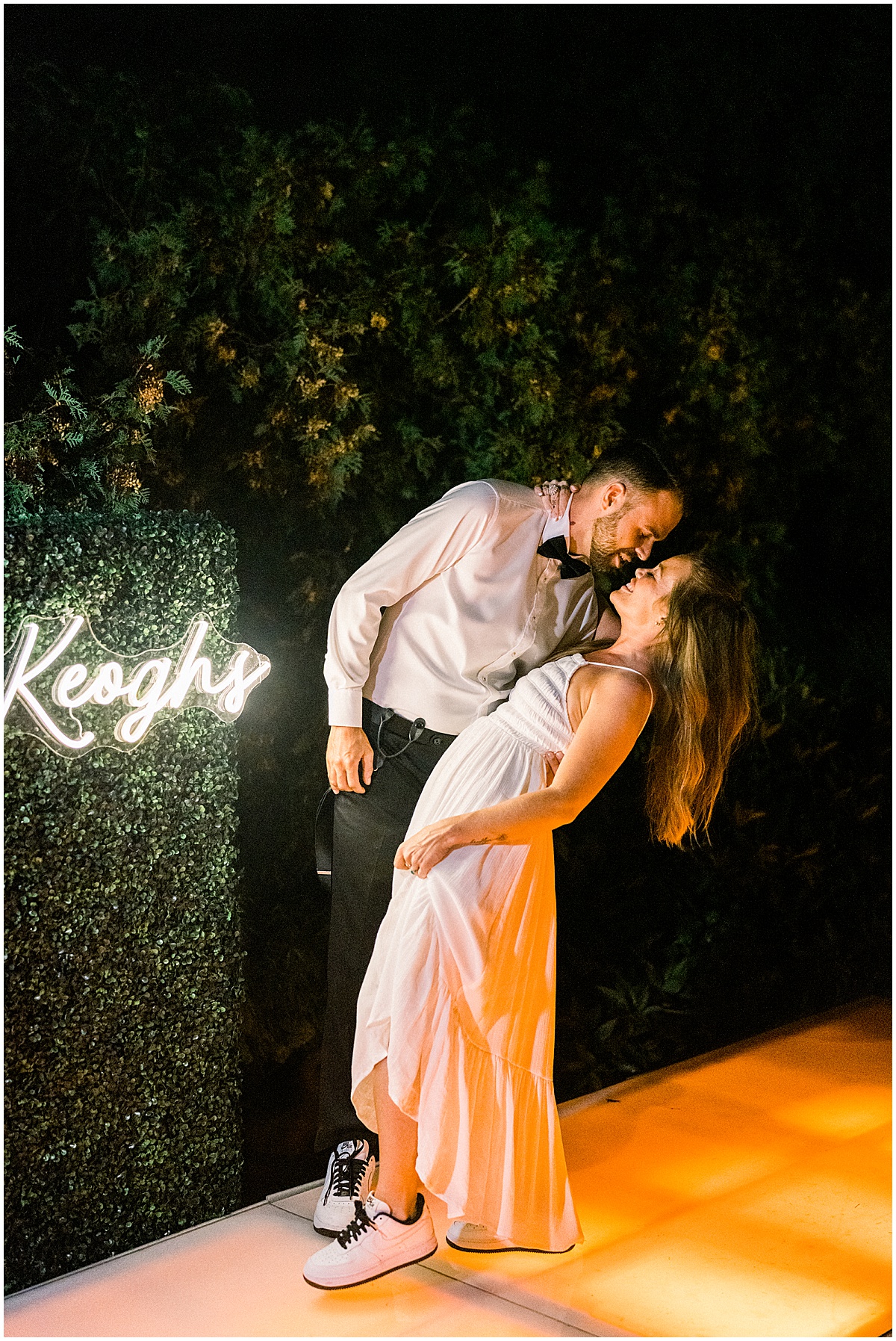 Tented Wedding Reception with Custom Neon sign in Long Island New York captured by LA photographer Pattengale Photography